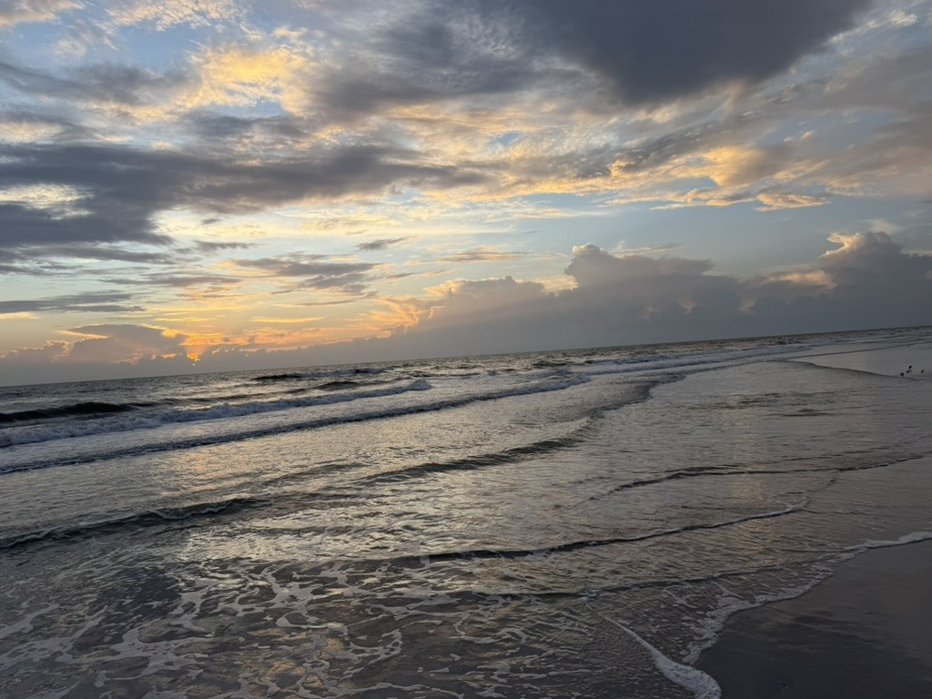 Glowing sunset clouds over the Gulf